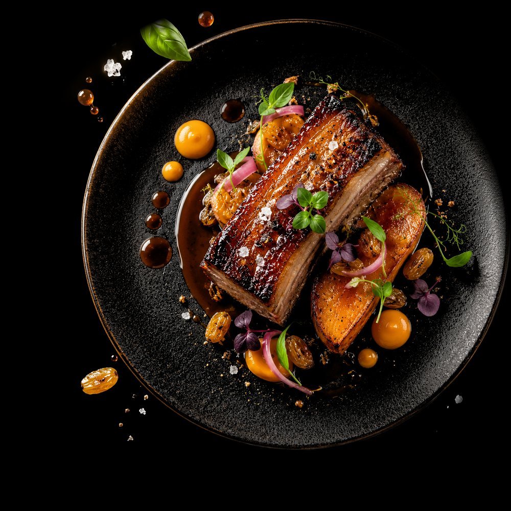 Lamb belly with honey glazed sweet potato, pickled sultanas and lamb jus from the degustation menu